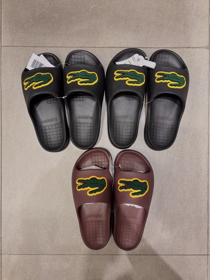 Lacoste serve slides 2.0 2026 (Category: Slippers & Slides) located in Pasay City. Submitted by ezhits (Listing ID 1460487465, Image 1). Description: PRE-ORDER NOW‼️👟 LC$TE SERVE 2.0 $LIDES 2026 BRAND NEW AVAILABLE SIZES: Men’s 8–12 📦 LIMITED STOCKS ONLY! 🚚 ETA: THIS WEEK 🔥 BUY NOW BEFORE STOCKS RUNS OUT!!! 📩 HIT ME UP‼️ TIA‼️.