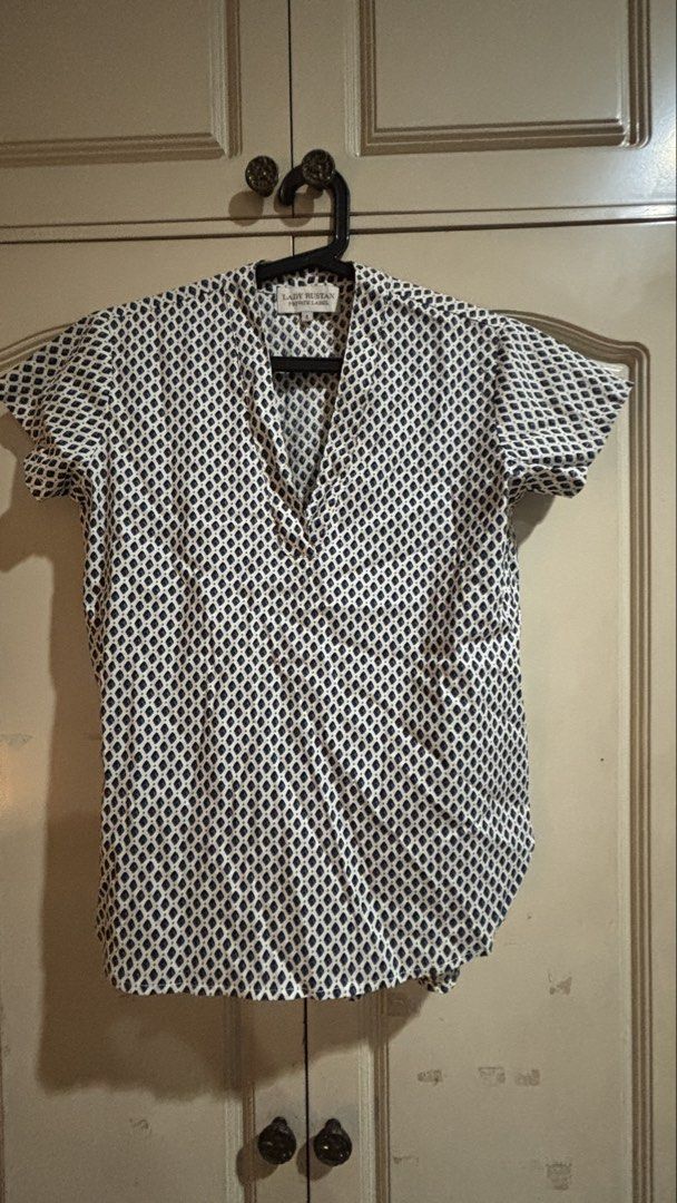 Lady Rustan Private Label White & Blue Patterned Blouse Size 4 (Category: Blouses) located in Manila. Submitted by daisiestuffph (Listing ID 1460324652, Image 1). Description: - Lady Rustan Private Label white blouse - Navy blue diamond pattern - Short sleeves - V-neckline - Size: 4 - Versatile for casual or dressy wear.