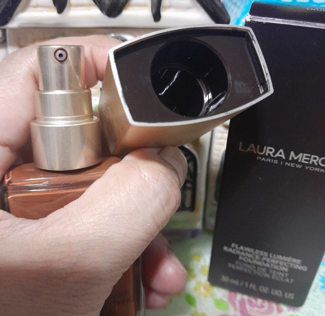 Laura Mercier Liquid Foundation (Category: Makeup) located in Las Pinas. Submitted by 84vintage (Listing ID 1460356497, Image 2). Description: Original price of 3k. Laura Mercier liquid foundation designed to provide a radiant and luminous finish. It offers medium to full coverage, provides up to 15 hours of hydration, and aims to improve skin luminosity and reduce the appearance of dullness and dark spots over time. It contains ingredients like 