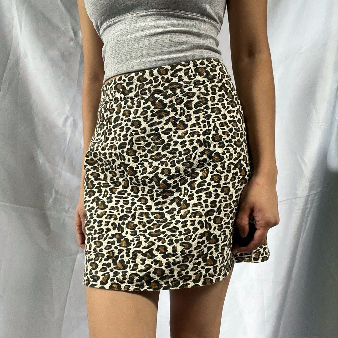 Leopard Print Mini Skirt with Built-in Shorts (Category: Skirts) located in Manila. Submitted by demi.rewears (Listing ID 1460314302, Image 3). Description: Cute leopard print mini skirt with built-in shorts. Perfect for casual or night outs. Easy to style! Size: Fits XS to Small Waist: Fits 24” to 26” (12.5” flat lay) Length: 14.5” (Mini skirt length).