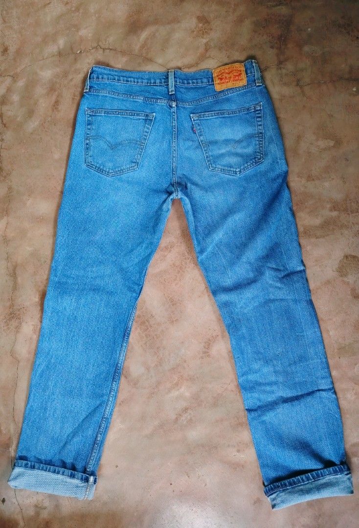 Levi's 514 Regular Fit Jeans W34 L32 (Category: Jeans) located in Manila. Submitted by louiefinds26 (Listing ID 1460314508, Image 1). Description: - Classic blue Levi's jeans - Regular fit, straight leg - Size: W34 L32 - Perfect for everyday wear - Shows light fading on legs - Cuffs rolled in photos.