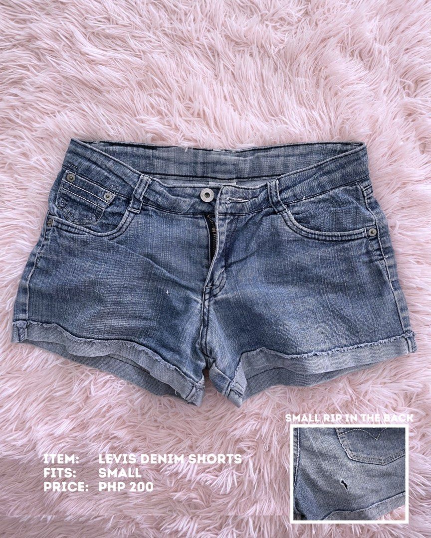 Levi's Denim Shorts - Size Small (Category: Shorts) located in Batangas. Submitted by shop.aalley (Listing ID 1460336055, Image 1). Description: - Levi's denim shorts - Size: Small - Color: Classic blue wash - Feature: Cuffed hem - Condition: Small rip on back pocket (see close-up photo) - Price: PHP 200.
