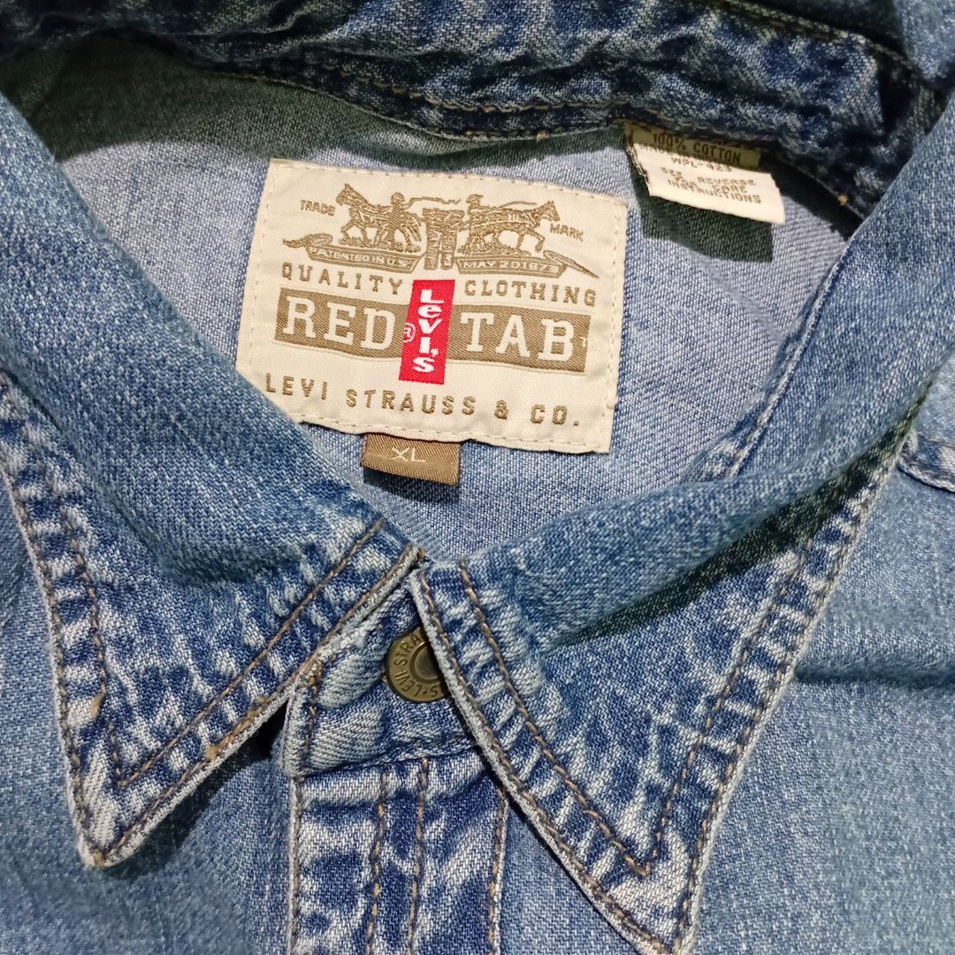 Levi's Red Tab Denim Shirt XL (Category: Tshirts & Polo Shirts ) located in Taguig. Submitted by conniemdcruz (Listing ID 1460481855, Image 2). Description: - Classic light wash denim shirt from Levi's Red Tab - Size XL - Button-up style - Two chest pockets - Long sleeves with button cuffs - Made from 100% cotton - Ideal for casual wear Vintage Levis Red tab Denim longsleeve Washed Xl 23x20 Excellent condition 800.