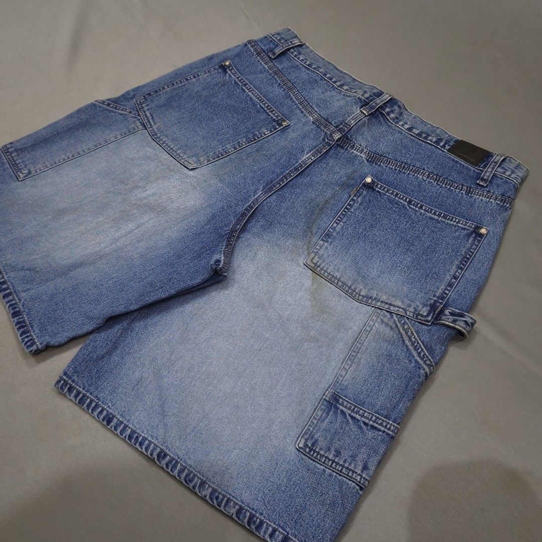 Levi's SilverTab Carpenter Jorts (Category: Shorts) located in Cebu City. Submitted by greedthrift.00 (Listing ID 1460438779, Image 2). Description: - condition: 9.8/10 - color rate: 9.8/10 - Issue: need wash only (washable stains) - waistline: 38" - length: 23" - leg opening: 14".