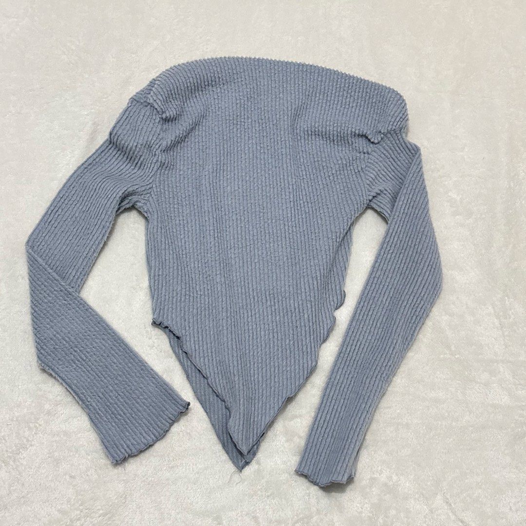 Light Blue Off-Shoulder Asymmetrical Hem Ribbed Knit Top (Category: Blouses) located in Bacoor. Submitted by jadiones (Listing ID 1460417095, Image 3). Description: - Super cute light blue ribbed knit top - Off-shoulder neckline - Unique asymmetrical pointed hem - Long sleeves - Very stretchy material for a comfortable fit - Stylish and versatile, pairs well with shorts or jeans.