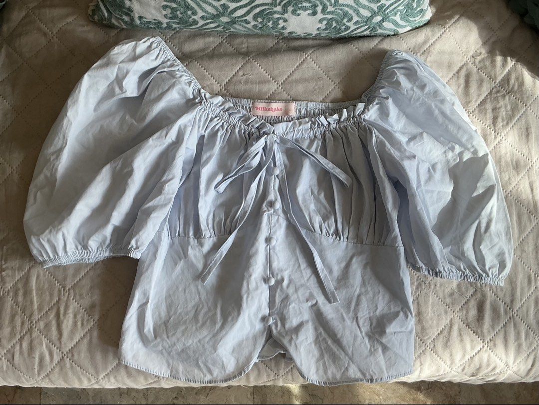 Light Blue Puff Sleeve Cottage Top (Category: Blouses) located in Pasay City. Submitted by hillene._ (Listing ID 1460348131, Image 1). Description: • Size: Medium - Large • Condition: The top is in good condition with no stains and has only been worn 1-2 times • Mode of Payment: Gcash, Bank Transfer • Mode of Delivery: Lalamove, J&T.