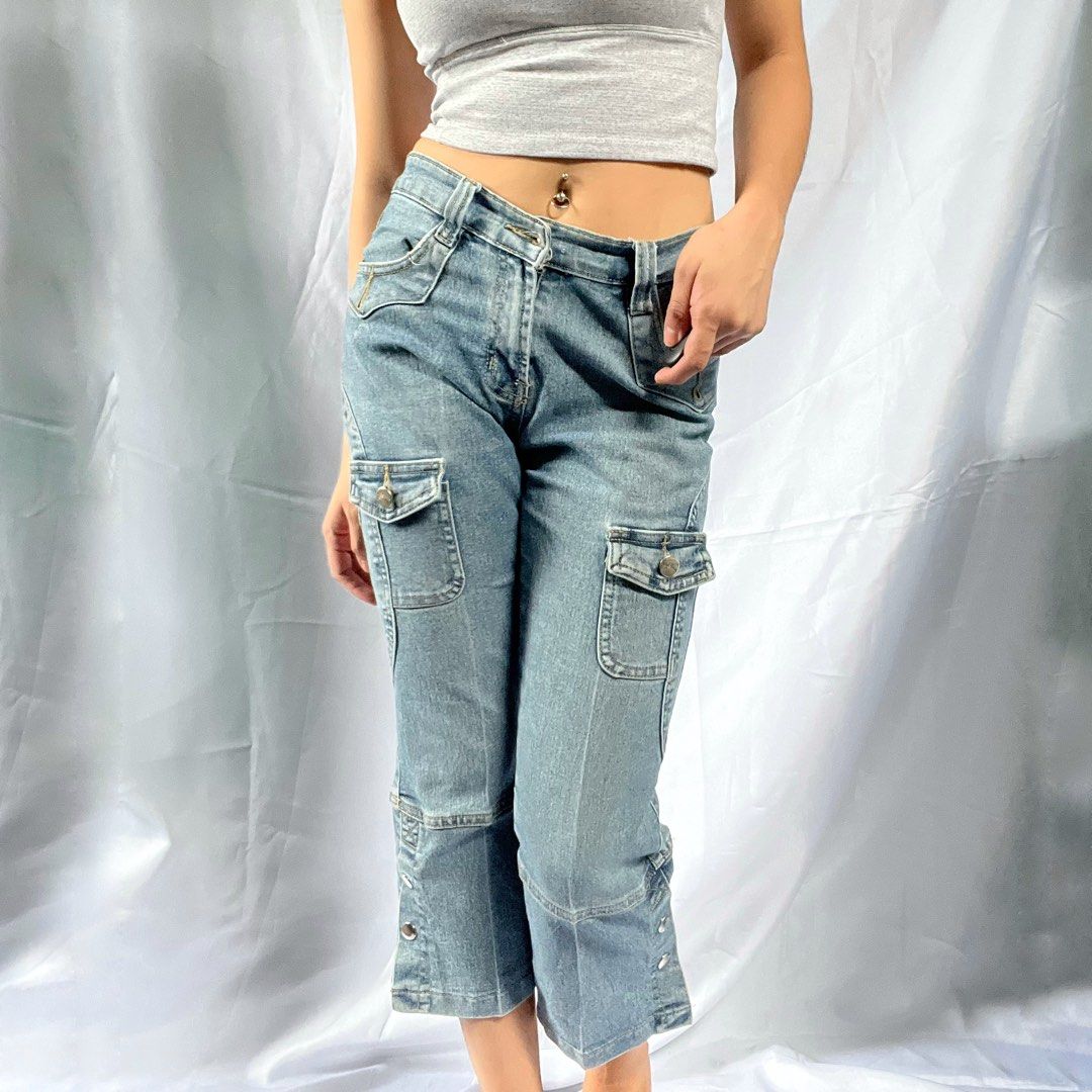 Light Wash Cargo Jeans with Button Detail (Category: Jeans) located in Manila. Submitted by demi.rewears (Listing ID 1460314450, Image 3). Description: Cute light wash cropped denim cargo jeans with Y2K vibes. Features button hem details, multiple pockets, and zipper/button closure. Perfect for casual wear. Size: Fits Small to Semi-Medium Waist: Fits 25” to 27” (13” flat lay) Length: 28” (Capri / Cropped length).