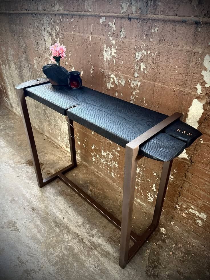 Live Edge Wood Console Table with Metal Legs (Category: Tables & Sets) located in Caloocan City. Submitted by blessed0fnature (Listing ID 1460481302, Image 2). Description: - Unique live edge wood console table - Beautiful natural wood grain with a dark, glossy finish - Sturdy black metal legs with a curved design - Ideal for entryways or behind sofas - Adds a rustic yet modern feel - Approx. [insert length] x [insert width] x [insert height].