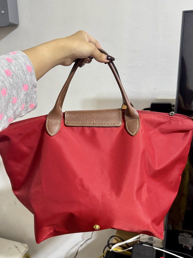 LongChamp In Medium (Category: Tote Bags) located in Rizal. Submitted by faven419 (Listing ID 1460476114, Image 2). Description: Good condition-no issue Jst signs of usage Guaranteed- BOUGHT IN JAPAN.