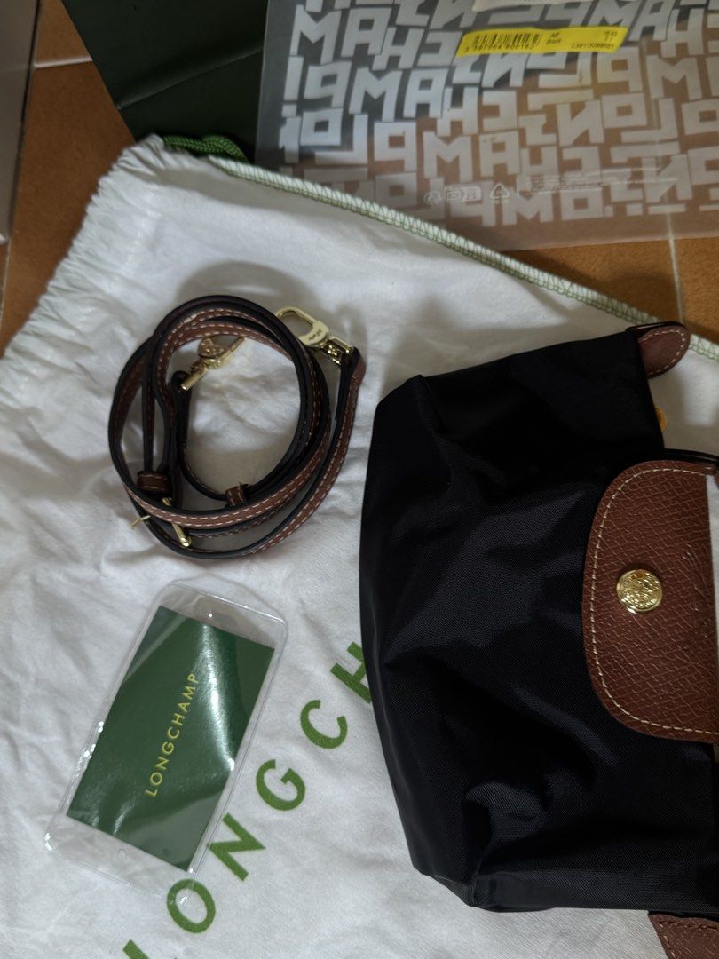Longchamp mini crossbody bag (Category: Cross-body Bags) located in Valenzuela. Submitted by aikeeee (Listing ID 1460385873, Image 2). Description: Authentic!!!! Bought last June at Dubai Complete inclusions Comes with strap (bought separately) Used once .