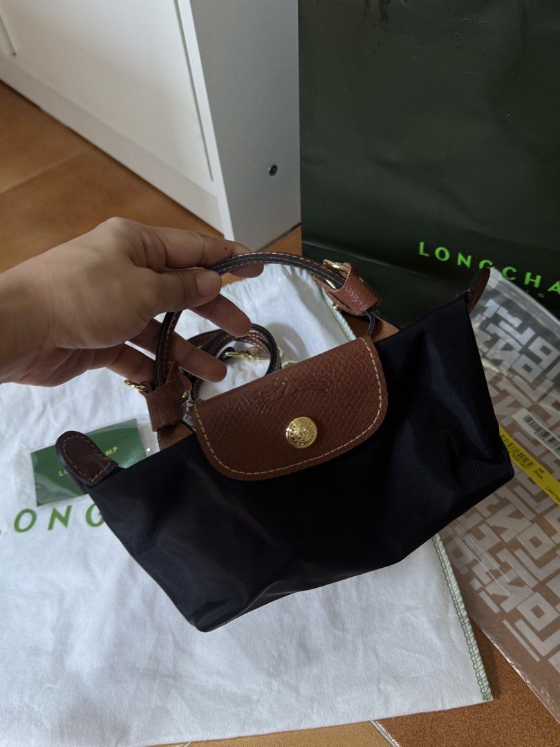 Longchamp mini crossbody bag (Category: Cross-body Bags) located in Valenzuela. Submitted by aikeeee (Listing ID 1460385873, Image 3). Description: Authentic!!!! Bought last June at Dubai Complete inclusions Comes with strap (bought separately) Used once .