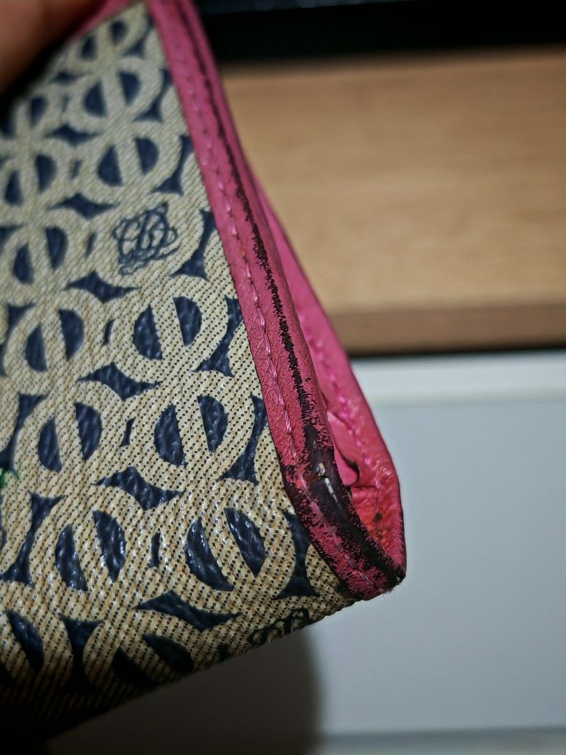 Louis Quatorze Monogram Wallet Pink Trim (Category: Wallets & Card holders) located in Manila. Submitted by cleverwhale_45b7bc (Listing ID 1460484495, Image 3). Description: - Authentic Louis Quatorze wallet - Signature monogram pattern - Chic pink leather trim - Secure snap closure - Shows minor wear on edges and hardware - Fully functional and stylish - Perfect for daily use.