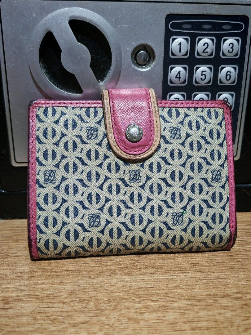 Louis Quatorze Monogram Wallet Pink Trim (Category: Wallets & Card holders) located in Manila. Submitted by cleverwhale_45b7bc (Listing ID 1460484495, Image 1). Description: - Authentic Louis Quatorze wallet - Signature monogram pattern - Chic pink leather trim - Secure snap closure - Shows minor wear on edges and hardware - Fully functional and stylish - Perfect for daily use.