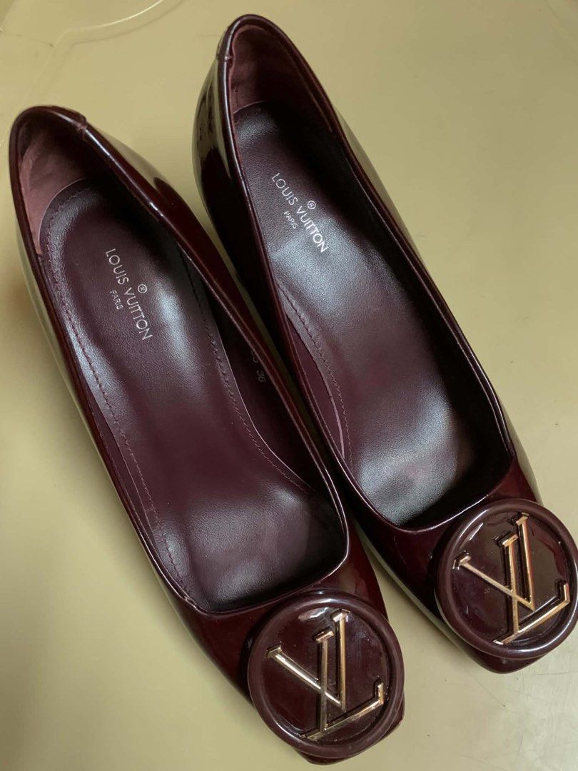 Louis Vuitton (Category: Heels) located in Manila. Submitted by kingblaize (Listing ID 1460493766, Image 2). Description: Louis Vuitton pumps accented with a prominent gold-tone LV circular logo on the toe..