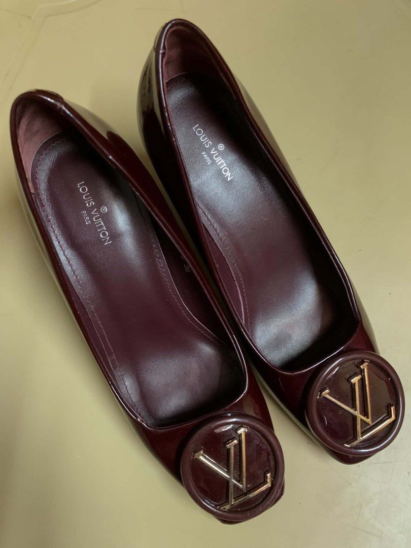 Louis Vuitton (Category: Heels) located in Manila. Submitted by kingblaize (Listing ID 1460493766, Image 1). Description: Louis Vuitton pumps accented with a prominent gold-tone LV circular logo on the toe..