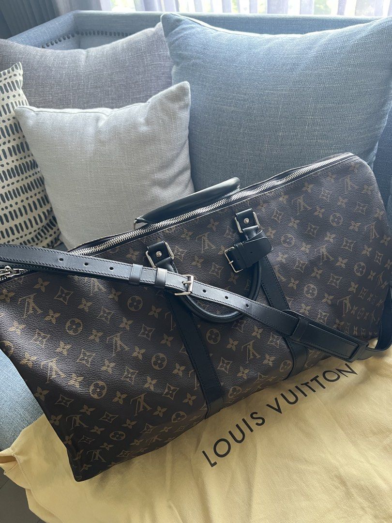 Louis Vuitton Keepall Bandoulière 55 Monogram Canvas (Category: Luxury Bags & Wallets) located in Muntinlupa City. Submitted by goodsbymjp (Listing ID 1460506752, Image 3). Description: - Classic Louis Vuitton Keepall Bandoulière 55 - Iconic Monogram canvas with sleek black leather trim - Spacious interior ideal for weekend getaways or extended travel - Comes with both comfortable handles and an adjustable shoulder strap - Authenticity is guarant
