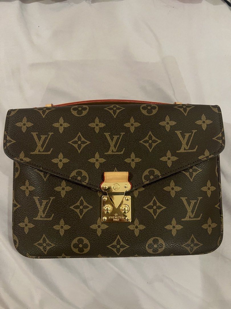 Louis Vuitton Pochette Metis (Category: Luxury Bags & Wallets) located in Manila. Submitted by jeanajesta (Listing ID 1460333497, Image 1). Description: - Classic Louis Vuitton monogram clutch - Iconic all-over LV print - Secure gold-tone clasp closure on the front - Convenient zippered pocket on the back - Ideal for carrying your daily essentials.