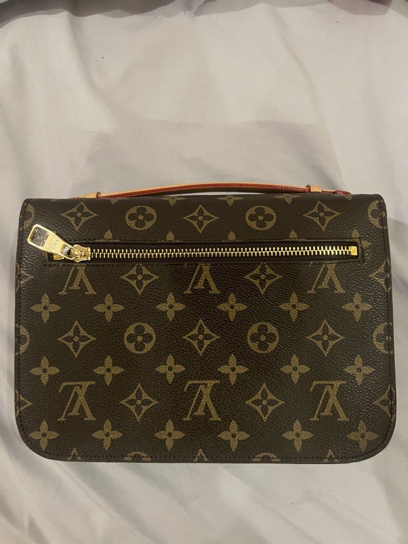 Louis Vuitton Pochette Metis (Category: Luxury Bags & Wallets) located in Manila. Submitted by jeanajesta (Listing ID 1460333497, Image 2). Description: - Classic Louis Vuitton monogram clutch - Iconic all-over LV print - Secure gold-tone clasp closure on the front - Convenient zippered pocket on the back - Ideal for carrying your daily essentials.