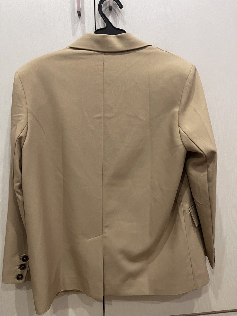 Love, Bonito Beige Single Button Blazer (Category: Coats, Jackets and Outerwear) located in Paranaque City. Submitted by chubby.bunny (Listing ID 1460484973, Image 2). Description: Love Bonito Blazer 🤎 Bought this in Hong Kong. Used once only and still in very good condition. Selling because it’s too long for me. - Classic beige blazer - Brand: Love, Bonito - Single button closure - Two side flap pockets - Versatile for work or casual outfits .