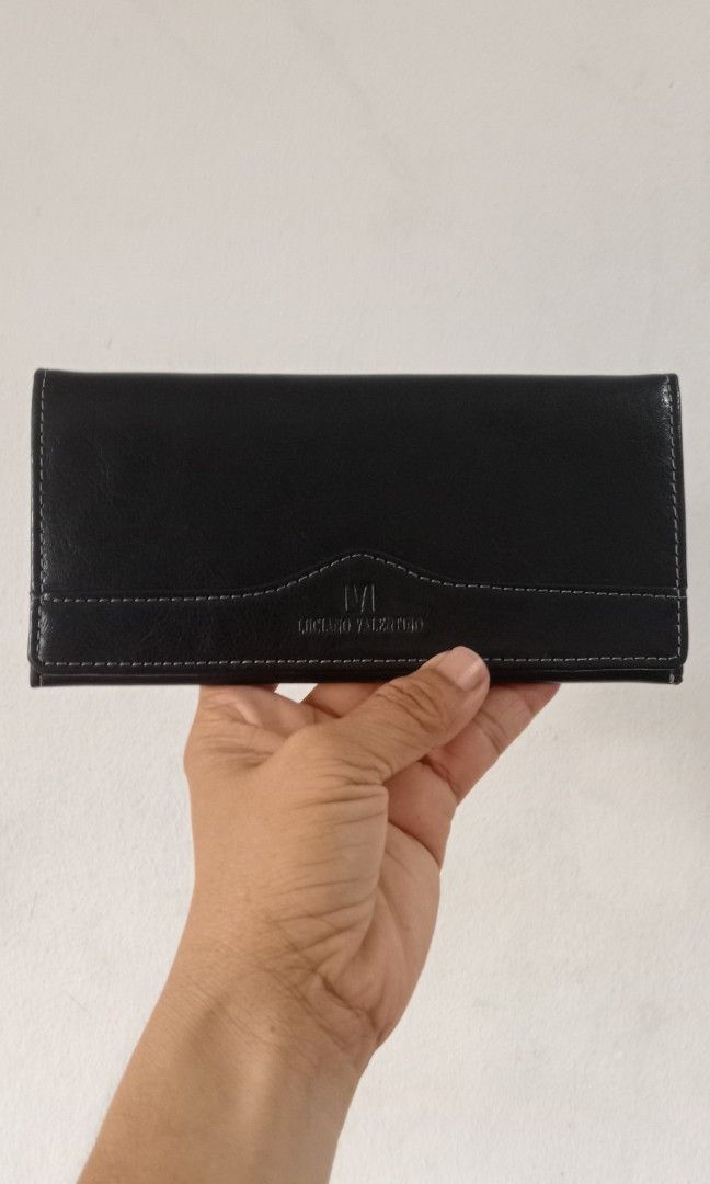 LUCIANO VALENTINO (Category: Wallets & Card holders) located in Tarlac. Submitted by faithfulfinds (Listing ID 1460340230, Image 1). Description: LUCIANO VALENTINO Long Wallet ✔️ Like new condition (Napakakinis, parang bago) ✔️ Genuine Cowhide Leather ✔️ Sleek black design with classic stitching.