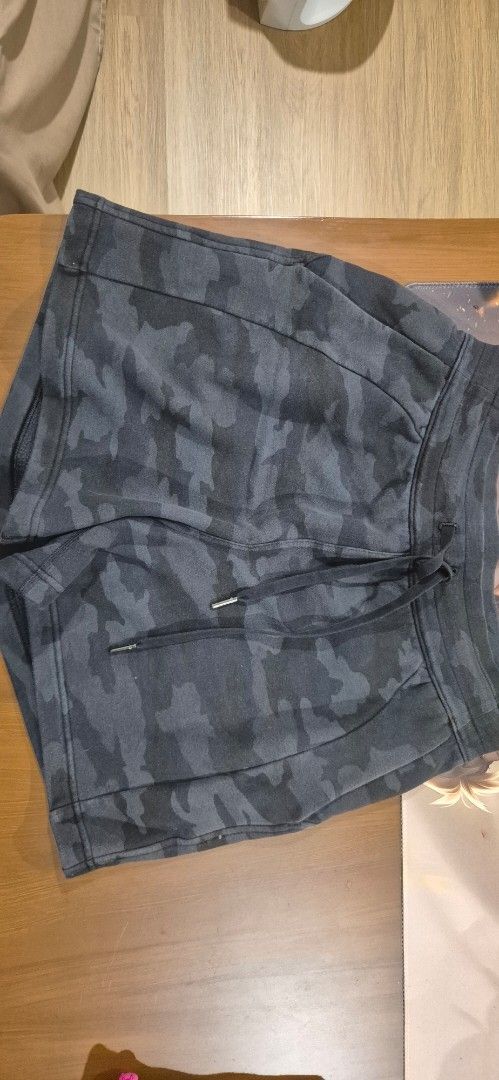 Lululemon Camo Sweat Shorts Size S (Category: Activewear) located in Makati City. Submitted by razorheadachemanila (Listing ID 1460361732, Image 1). Description: - Lululemon grey camouflage sweat shorts - Elastic waistband with drawstring - Two side pockets - Made in Vietnam - Comfortable cotton blend fabric - Ideal for lounging and casual wear.