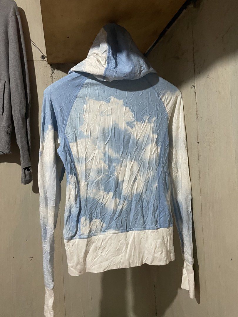 Lululemon Cloud Tie-Dye Zip-Up Hoodie (Category: Coats, Jackets and Outerwear) located in Davao. Submitted by houkaygoods (Listing ID 1460309303, Image 3). Description: - Adorable Lululemon hoodie - Blue and white cloud tie-dye pattern - Full zip-up front - Drawstring hood - Iconic Lululemon logo on chest - Long sleeves - Ideal for casual outings or workouts Minimal washable stains 14x22.