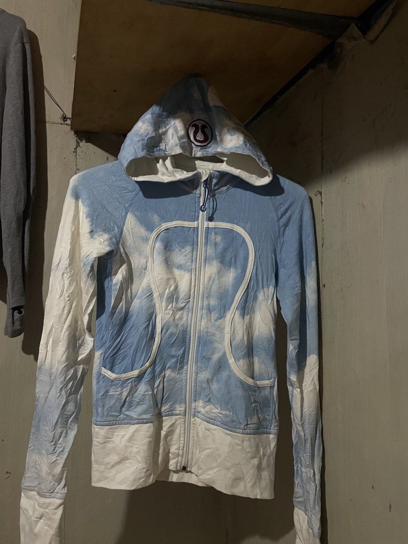 Lululemon Cloud Tie-Dye Zip-Up Hoodie (Category: Coats, Jackets and Outerwear) located in Davao. Submitted by houkaygoods (Listing ID 1460309303, Image 1). Description: - Adorable Lululemon hoodie - Blue and white cloud tie-dye pattern - Full zip-up front - Drawstring hood - Iconic Lululemon logo on chest - Long sleeves - Ideal for casual outings or workouts Minimal washable stains 14x22.