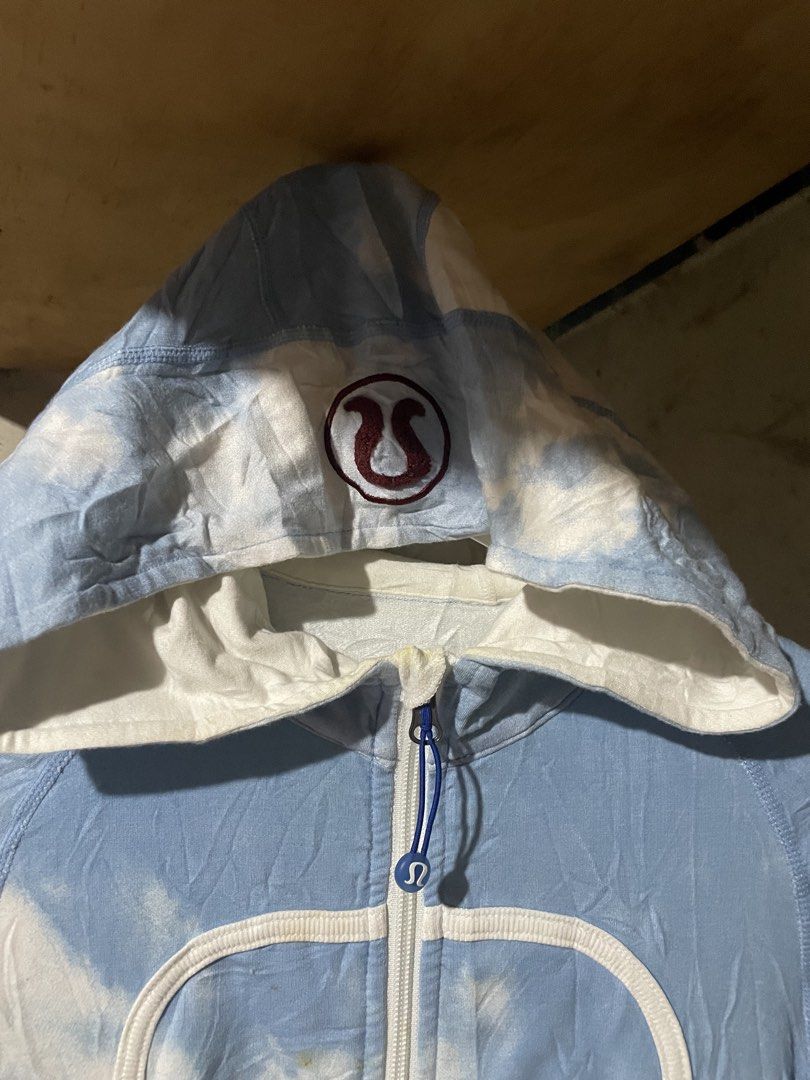 Lululemon Cloud Tie-Dye Zip-Up Hoodie (Category: Coats, Jackets and Outerwear) located in Davao. Submitted by houkaygoods (Listing ID 1460309303, Image 2). Description: - Adorable Lululemon hoodie - Blue and white cloud tie-dye pattern - Full zip-up front - Drawstring hood - Iconic Lululemon logo on chest - Long sleeves - Ideal for casual outings or workouts Minimal washable stains 14x22.