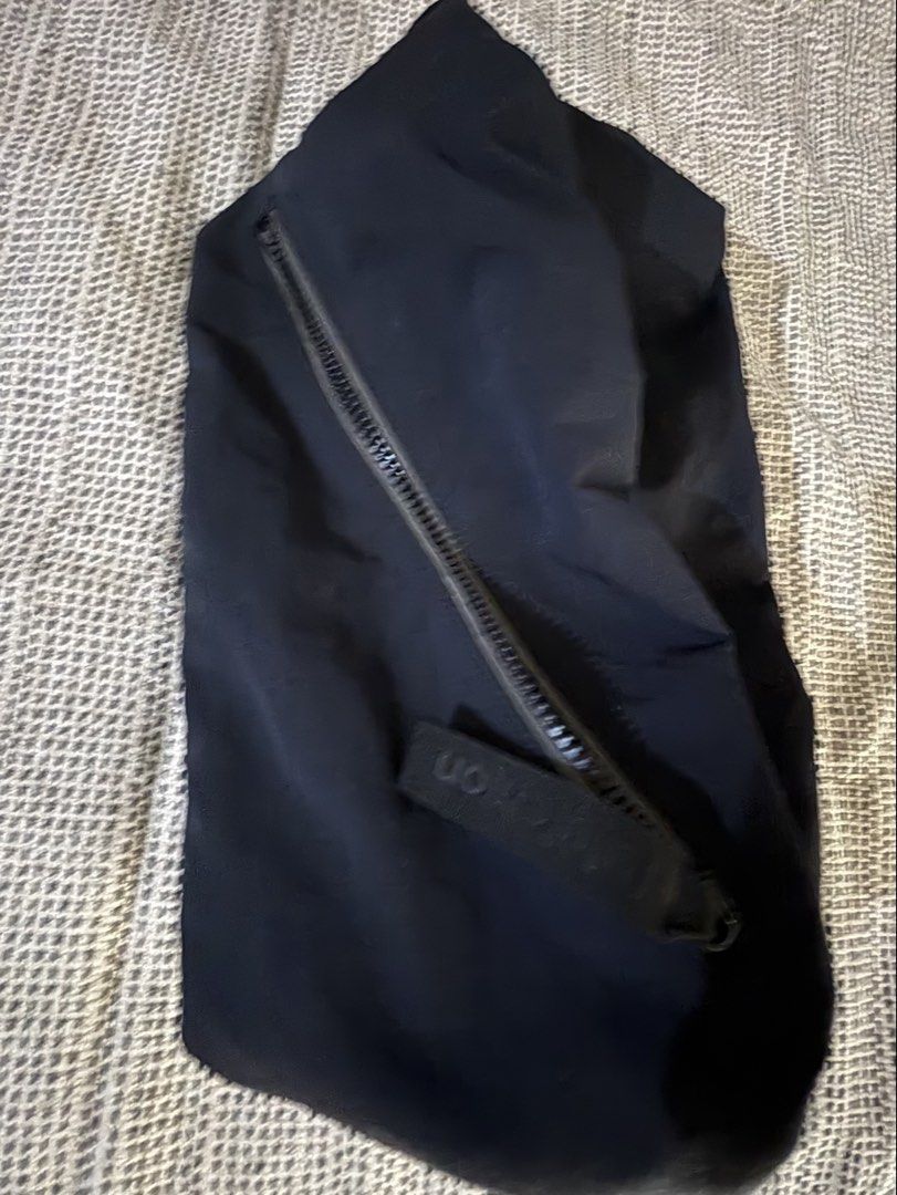 ORIGINAL AUTHENTIC LEGIT |Lululemon Fast Track Bag 1st Release (Category: Sling Bags) located in Makati City. Submitted by bcbcbcbee (Listing ID 1460416597, Image 2). Description: - Lululemon Everywhere Belt Bag - Color: Black - Material: Nylon - Features: Main zippered compartment, exterior zippered pocket - Strap: Adjustable - Ideal for: Everyday use, workouts - Condition: Clean and ready for a new owner.