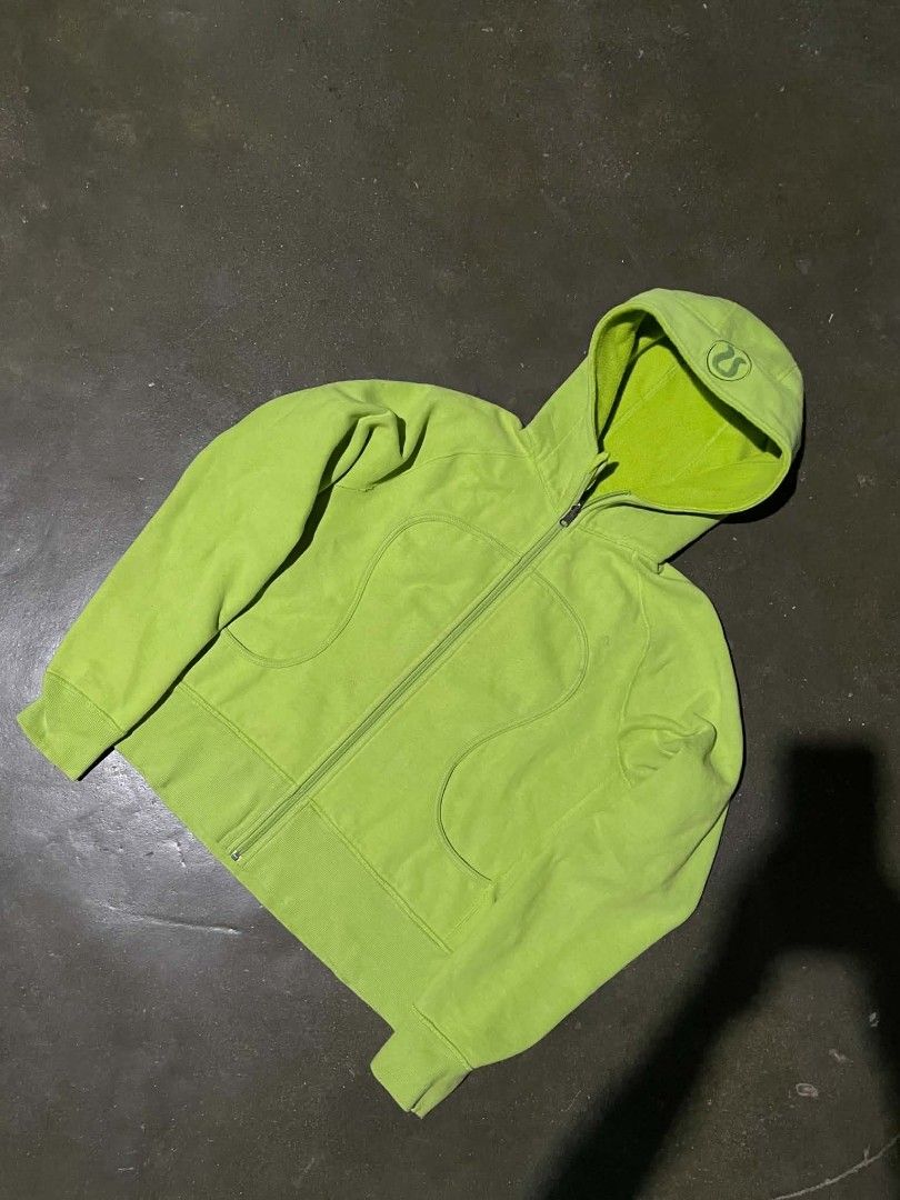 Lululemon Lime Green Zip-Up Hoodie (Category: Coats, Jackets and Outerwear) located in Munoz. Submitted by bb_jimbo0 (Listing ID 1460476480, Image 2). Description: - Bright lime green Lululemon zip-up hoodie - Classic Lululemon logo detail on the hood - Two convenient front pockets - Comfortable and casual design - Ideal for workouts or everyday wear.