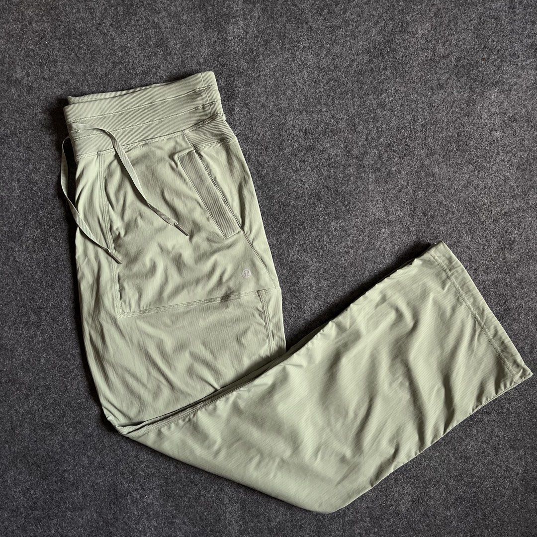 Lululemon Track Pants Sage Green Drawstring Waist (Category: Other Bottoms) located in Cebu City. Submitted by booksii3232 (Listing ID 1460349613, Image 2). Description: - Sage green Lululemon track pants - Lightweight material with subtle pinstripe texture - Elastic waistband with adjustable drawstring - Two convenient side pockets - Classic straight leg cut - Ideal for lounging or light workouts.