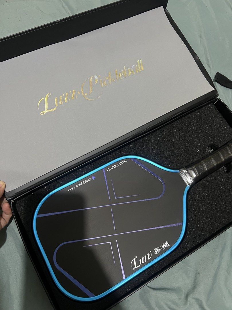 Luzz Inferno Blue Blaze Pickleball Paddle (Category: Racket and Ball Sports) located in Taguig. Submitted by 0218rawr (Listing ID 1460494992, Image 2). Description: ✅NFC Authenticated ✅Unused Paddle/100% Brand New ✅Price negotiable.