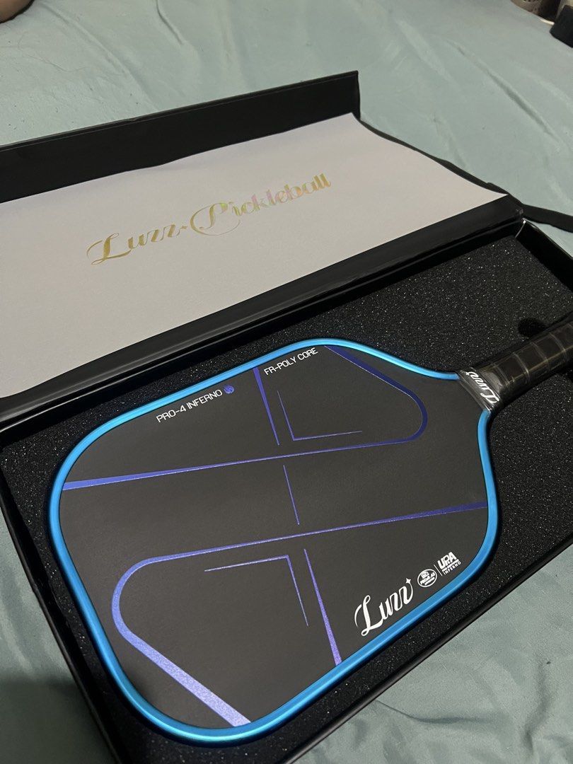 Luzz Inferno Blue Blaze Pickleball Paddle (Category: Racket and Ball Sports) located in Taguig. Submitted by 0218rawr (Listing ID 1460494992, Image 1). Description: ✅NFC Authenticated ✅Unused Paddle/100% Brand New ✅Price negotiable.