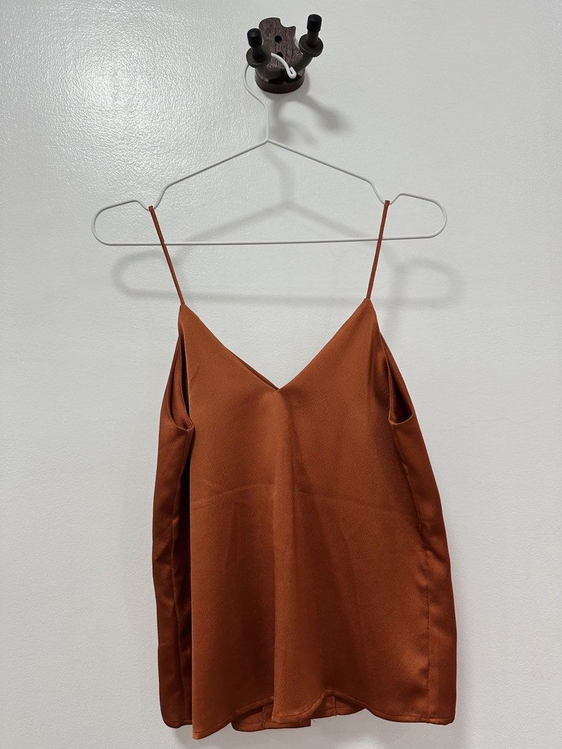 Mango Orange Sleevless Button Down Blouse (Category: Sleeveless) located in Paranaque City. Submitted by kokoclosets (Listing ID 1460496486, Image 2). Description: Used once or twice only!.