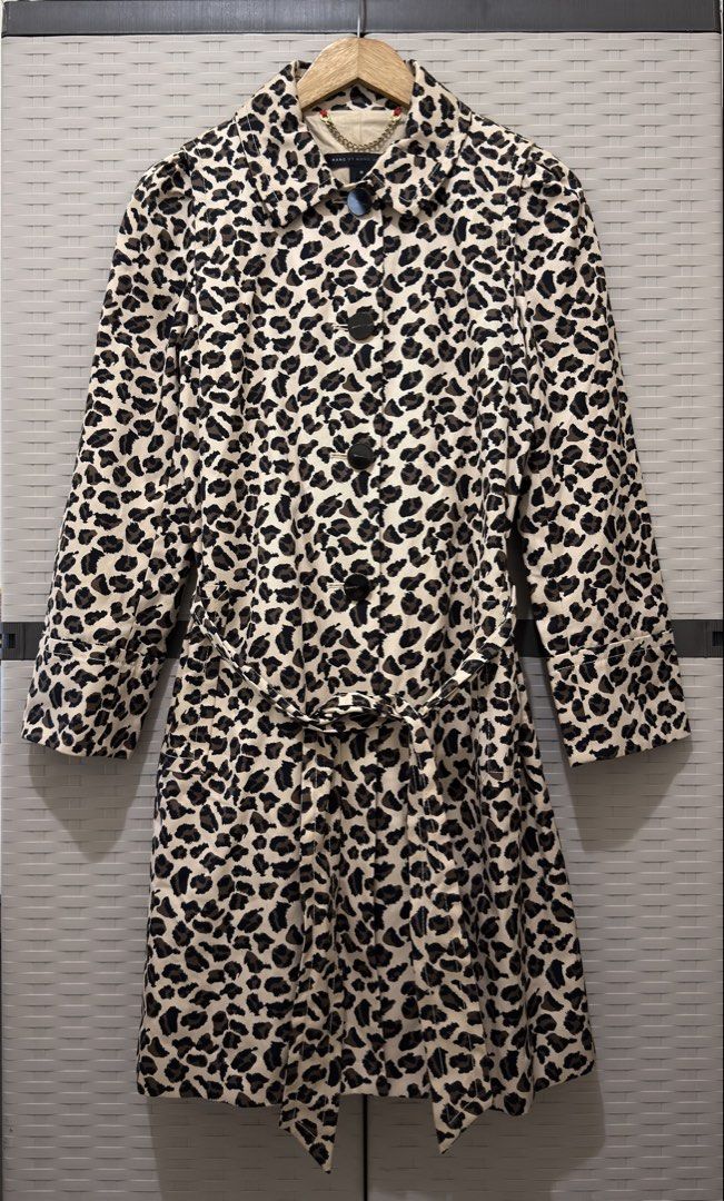 MARC BY MARC JACOBS LEOPARD PRINT BELTED TRENCH COAT (Category: Coats, Jackets and Outerwear) located in Santa Cruz. Submitted by hongkongmarketph (Listing ID 1460486720, Image 1). Description: MARC BY MARC JACOBS LEOPARD PRINT BELTED COAT Authentic 💯 Size medium COLLAR WITH GOLD TRIMMED BUTTON FASTEN TO FRONT TIE BELT TO WAIST SIDE POCKETS LONG SLEEVES JUST ABOVE KNEE LENGTH WITH VENT TO REAR .