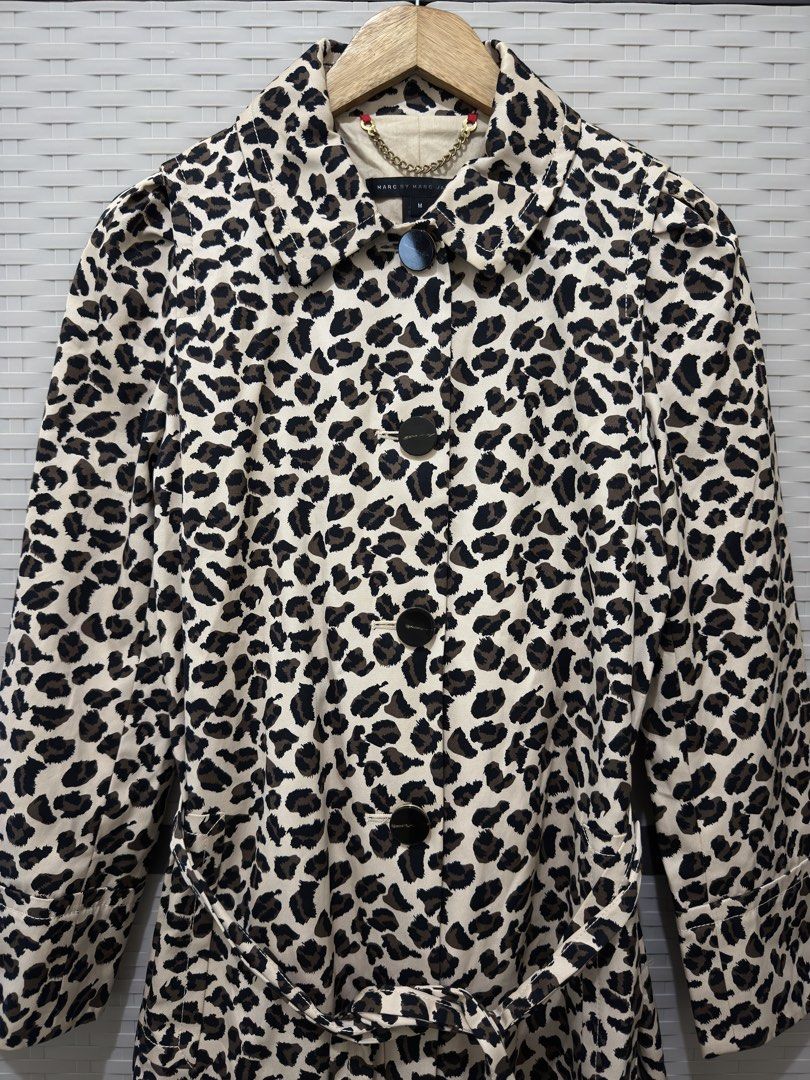 MARC BY MARC JACOBS LEOPARD PRINT BELTED TRENCH COAT (Category: Coats, Jackets and Outerwear) located in Santa Cruz. Submitted by hongkongmarketph (Listing ID 1460486720, Image 2). Description: MARC BY MARC JACOBS LEOPARD PRINT BELTED COAT Authentic 💯 Size medium COLLAR WITH GOLD TRIMMED BUTTON FASTEN TO FRONT TIE BELT TO WAIST SIDE POCKETS LONG SLEEVES JUST ABOVE KNEE LENGTH WITH VENT TO REAR .
