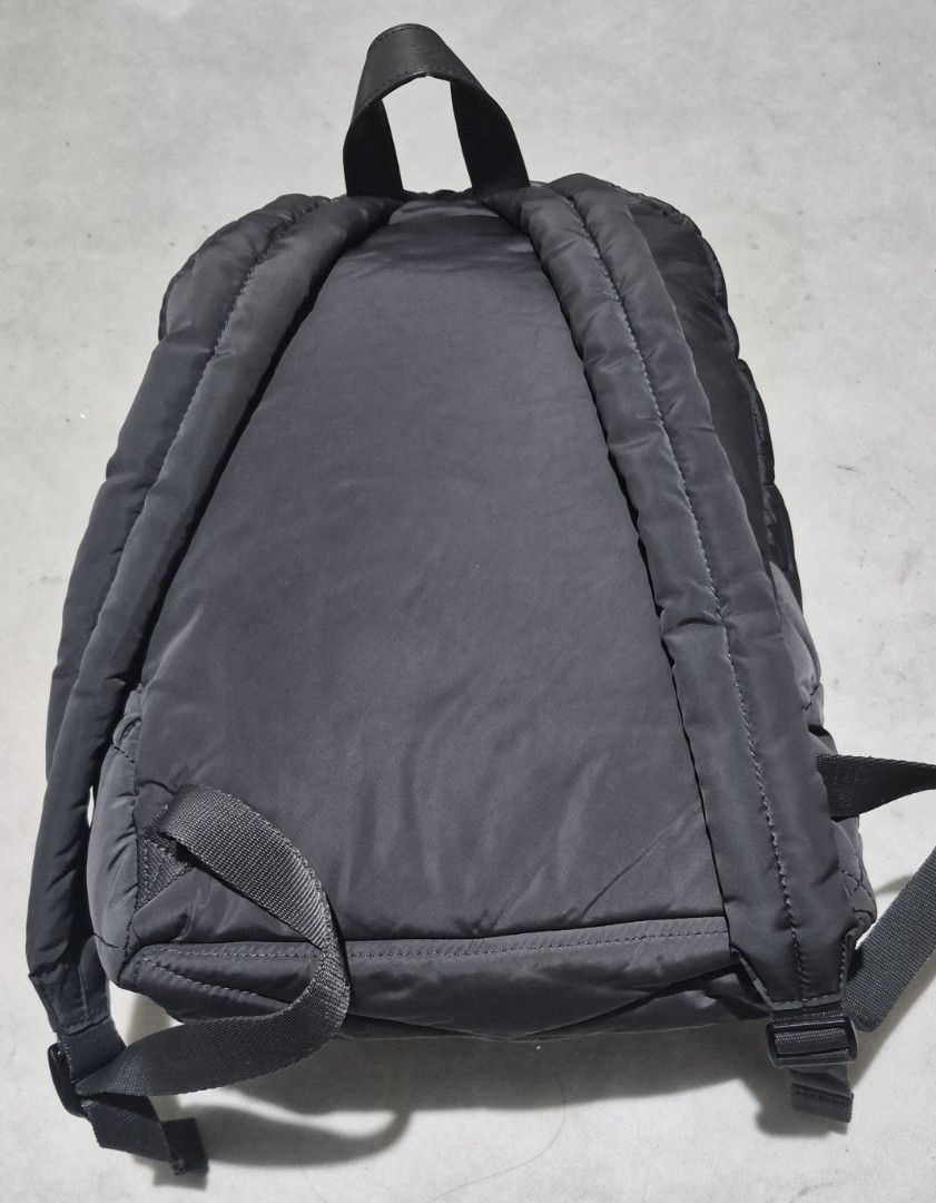 Marc Jacobs Quilted Nylon Backpack (Category: Backpacks) located in Marikina City. Submitted by mgfc926 (Listing ID 1460360481, Image 2). Description: - Brand: Marc Jacobs - Material: Quilted Nylon - Color: Black - Features: Front zip pocket, main compartment, adjustable straps - Dimensions: Approx. 16 inches tall x 8 inches wide - Ideal for: Everyday use.