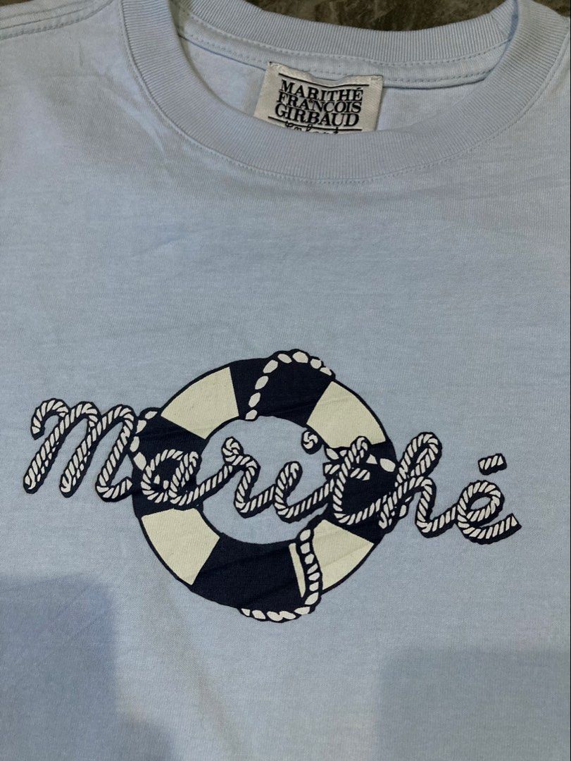 Marithe&Francois Girbaud Kids Tshirt (Category: Babies & Kids Fashion) located in General Santos City (Dadiangas). Submitted by amorhesthrift (Listing ID 1460382551, Image 3). Description: New condition Size-8-10Y Kasya adult-Xs-Small This is a light blue children’s t-shirt from Marithé + François Girbaud Enfant featuring a floating life preserver tube logo design.