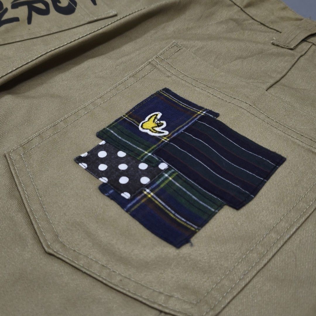 Mark Gonzales Patchwork Utility Shorts (Category: Shorts) located in Cebu City. Submitted by greedthrift.00 (Listing ID 1460455764, Image 3). Description: - condition: 9.8/10 - color rate: 9.8/10 - Issue: see last pic (replaceable) - waistline: 34" can fit 32-34 (adjustable) - length: 23" - leg opening: 11".