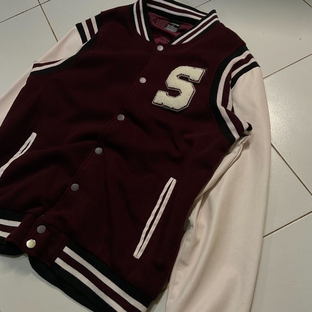 MAROON & WHITE 'S' LETTERMAN VARSITY JACKET (Category: Coats, Jackets and Outerwear) located in Morong. Submitted by rusty.vault (Listing ID 1460416101, Image 3). Description: - Classic maroon and white varsity jacket - Features a prominent 'S' patch on the chest - Ribbed cuffs, collar, and hem with stripe details - Button-up front closure - Ideal for a casual, sporty aesthetic - Perfect for cooler weather.