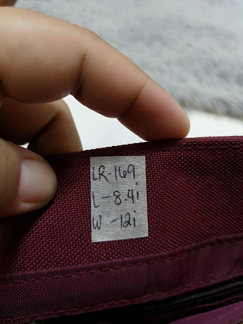 Maroon With Brown Strap Hand Bag (Category: Purses & Pouches) located in Santa Cruz. Submitted by jmy_surplus.2 (Listing ID 1460450601, Image 2). Description: Size ; L -8.4 W - 12 Color ; Maroon Type ; Hand bag Brand ; No brand Material ; nylon Style ; Maroon Hand bag LR 169 JMY 5 Batch #218.