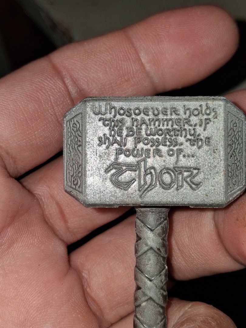 Marvel Thor Mjolnir Keychain (Category: Western Merchandise) located in Manila. Submitted by marcas022798212 (Listing ID 1460440932, Image 3). Description: - Cool Thor Mjolnir keychain - Features the inscription: 'Whosoever holds this hammer if they be worthy shall possess the power of Thor' - Includes Marvel and 2011 copyright info - Ideal gift for any Marvel fan - Attached to a durable metal keyring.