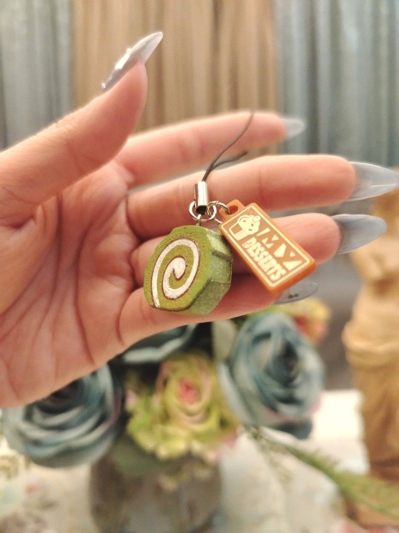 Matcha Cake Roll Dessert Keychain (Category: Designer & Blind Box Toys) located in San Fernando. Submitted by jpmarketplace2023 (Listing ID 1460429587, Image 2). Description: 💚 All items are authentic from Japan. 💛 MOP: GCash (❌️ GCash Protect) 🩵 MOD: LBC only (❌️ S. Checkout, COD, COP) 💙 Meet-up: Vista Mall, San Fernando, Pampanga 💜 All items are on-hand. 🧡 First to pay gets the item first. ❤️ Breakable items are packed with care and cauti