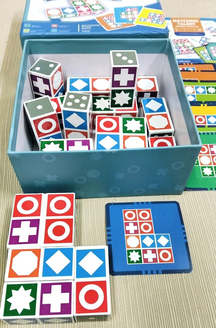 Matchings Talent Puzzle Game (Category: Educational & Learning Toys) located in Taguig. Submitted by Bloomscorner1 (Listing ID 1460402774, Image 3). Description: - Fun matching puzzle game for kids aged 36 months and up. - Contains 20 high quality wooden blocks, 60 pattern cards - Encourages observation, creativity, and hand-eye coordination. - Includes multiple challenge cards and colorful blocks with different patterns. - Great for developing c