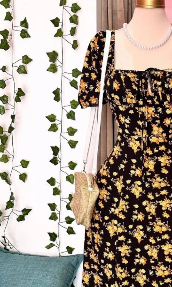 Maxi dress (Category: Dresses) located in Manila. Submitted by rizzyy_14 (Listing ID 1460442430, Image 1). Description: “Blooming in vintage charm 🌼🖤 A dreamy floral dress with a sweetheart neckline and puff sleeves.” fits med to large w/ side slit.