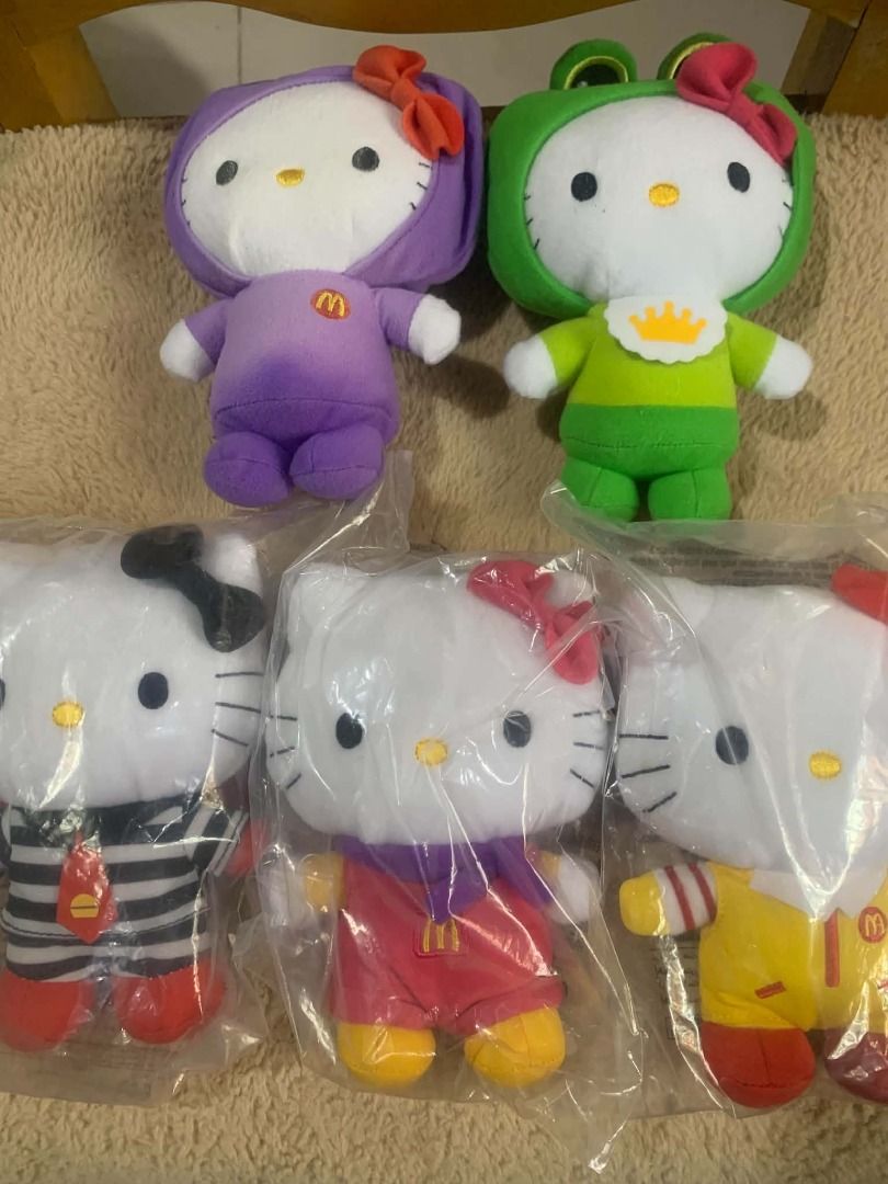 McDonald's Hello Kitty Plush Toys Collection (Category: Plushies & Soft Toys) located in Davao. Submitted by ajonlineshop.24 (Listing ID 1460368191, Image 1). Description: - Set of McDonald's Kitty plush toys - Features characters in various McDonald's-themed outfits - Includes purple hoodie, green frog costume, and employee uniforms - Some plush toys are still in original packaging - Ideal for collectors and Kitty enthusiasts.