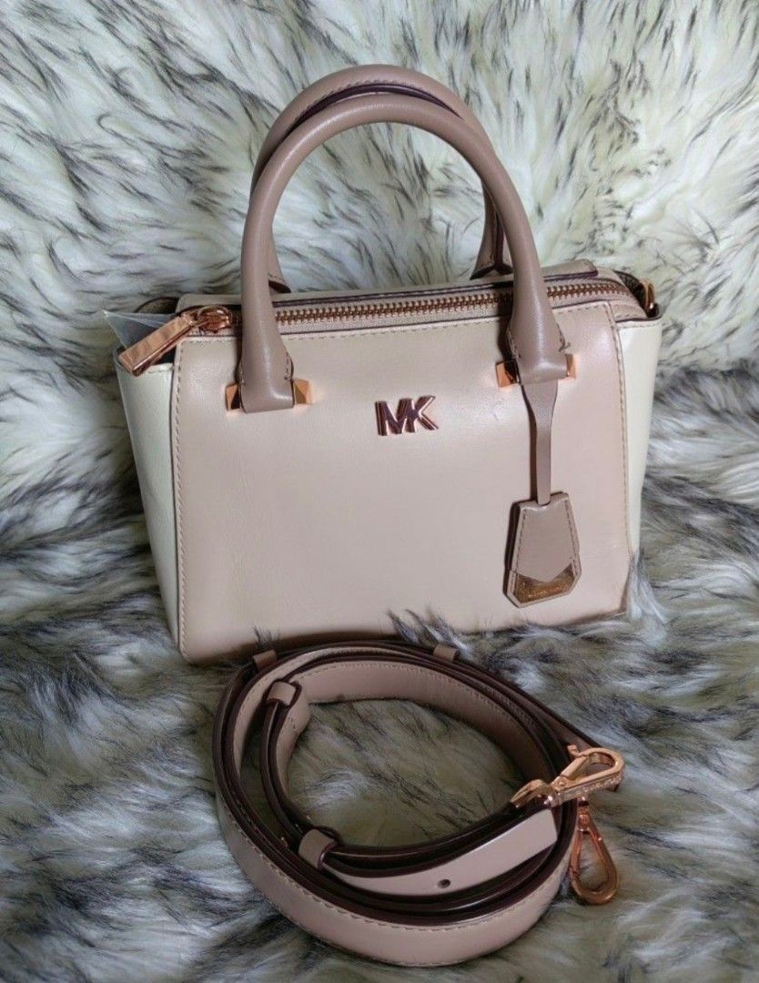 Michael Kors and Guess (Category: Cross-body Bags) located in Bulacan. Submitted by shoppevie_mkg (Listing ID 1460378054, Image 2). Description: authentic michael krs MK and Guess bag 2k each MK like new condition, no flaws only signs of wear. Gueess fur bag is brandnew message for addn'l photo.