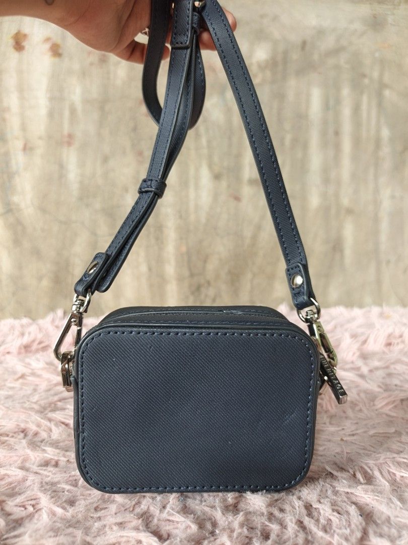 Micro sling bag (Category: Cross-body Bags) located in Manila. Submitted by ukay-ukaybylyn (Listing ID 1460306577, Image 2). Description: nasa 2 last picture minimal flaws parang marka lang naman sya.