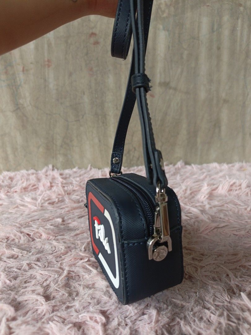 Micro sling bag (Category: Cross-body Bags) located in Manila. Submitted by ukay-ukaybylyn (Listing ID 1460306577, Image 3). Description: nasa 2 last picture minimal flaws parang marka lang naman sya.