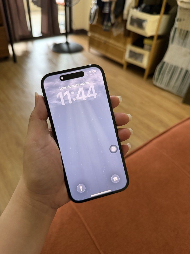 Midnight Black Iphone 14pro (Category: iPhone 14 Series) located in Pasig City. Submitted by regineski (Listing ID 1460307121, Image 1). Description: - iPhone 14 Pro - Color: Midnight Black - Storage: 128GB - Condition: Well used and has visible marks as shown on the pic. Also battery health is at 77% - Sleek and sophisticated design.